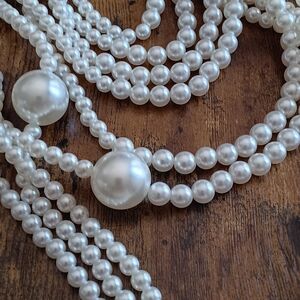 Nine strand faux pearls with earrings